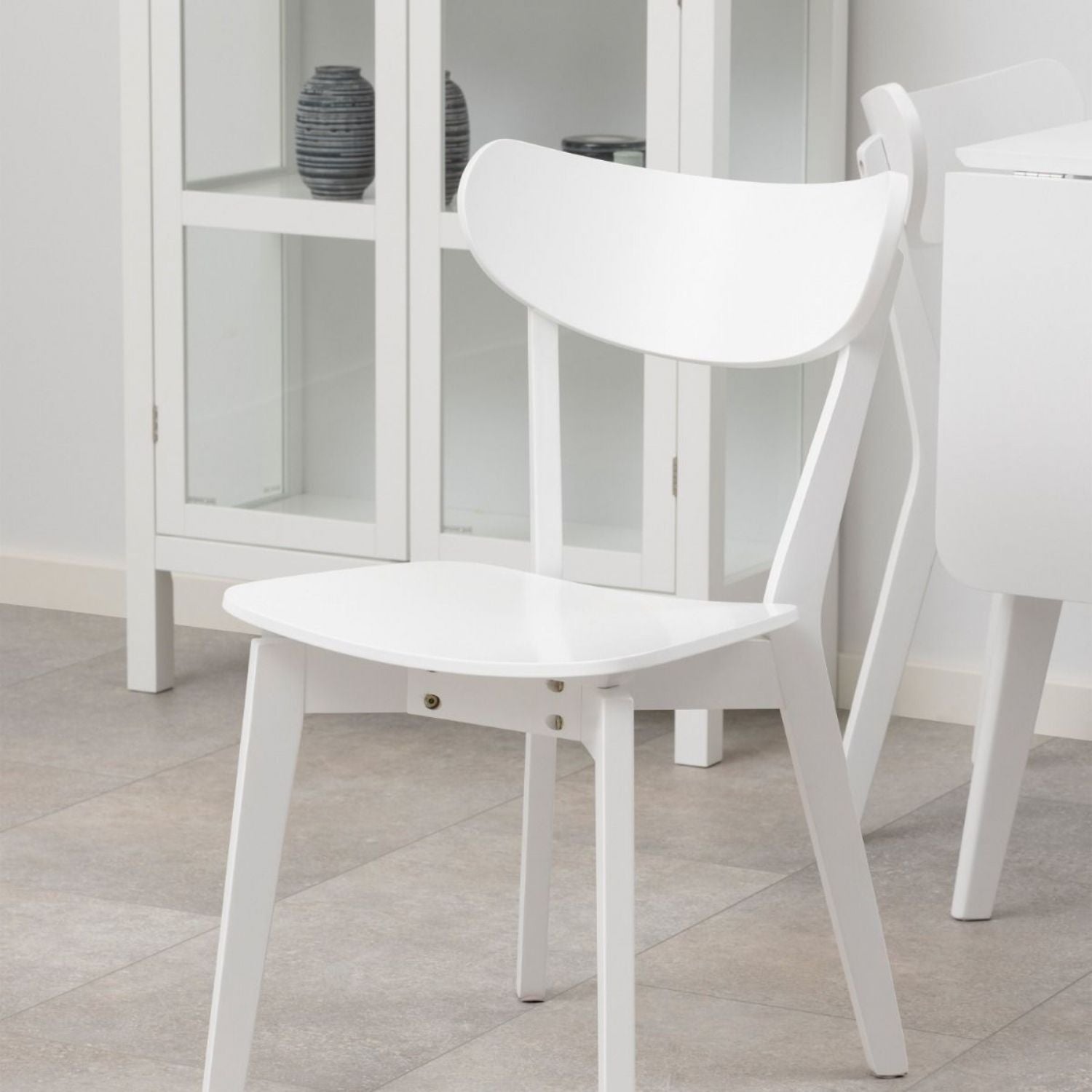 Roxby Square Dining Table in White includes 4 Roxby Dining Chair in White