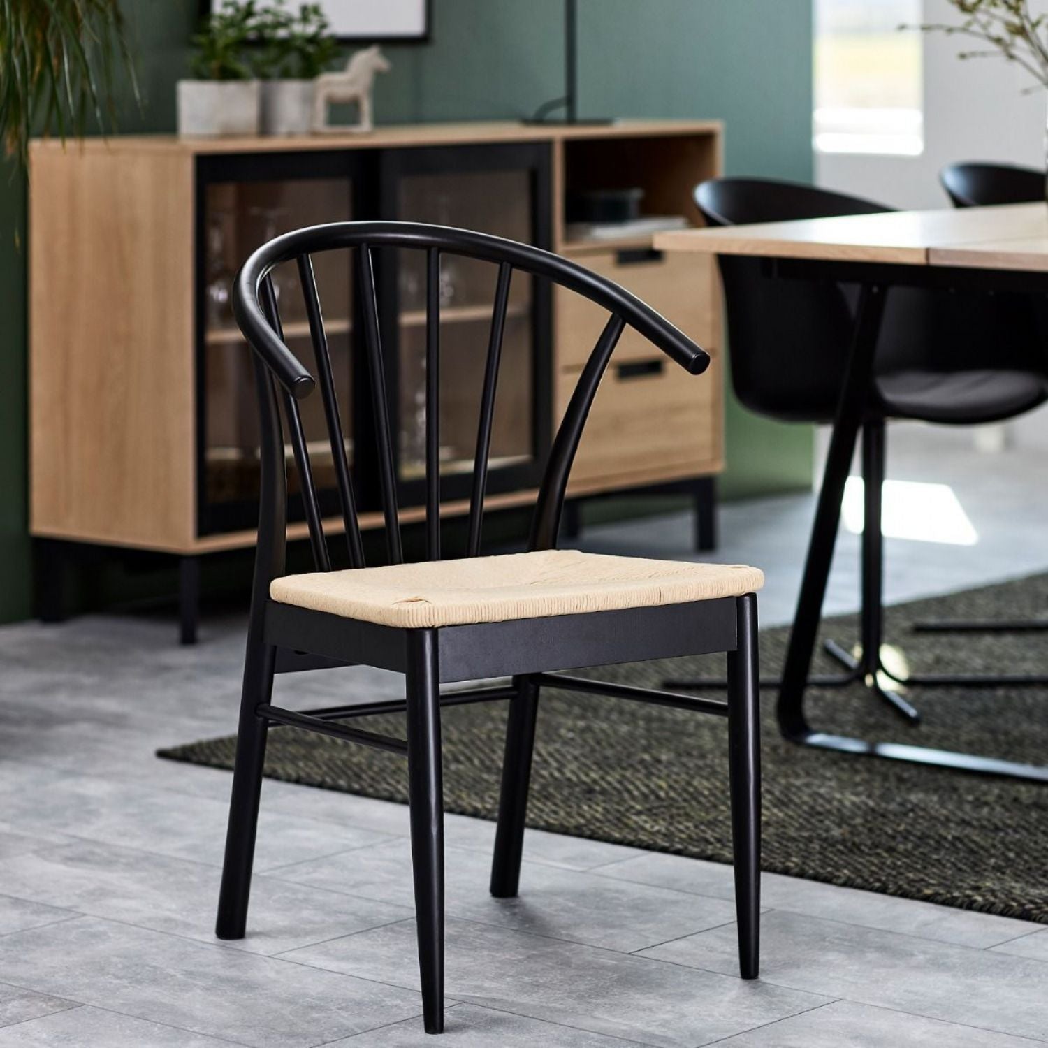Montreux Round Extending Dining Table in Black 115154 cm includes 6 Cassandra Dining Chair includes Armrest in Black