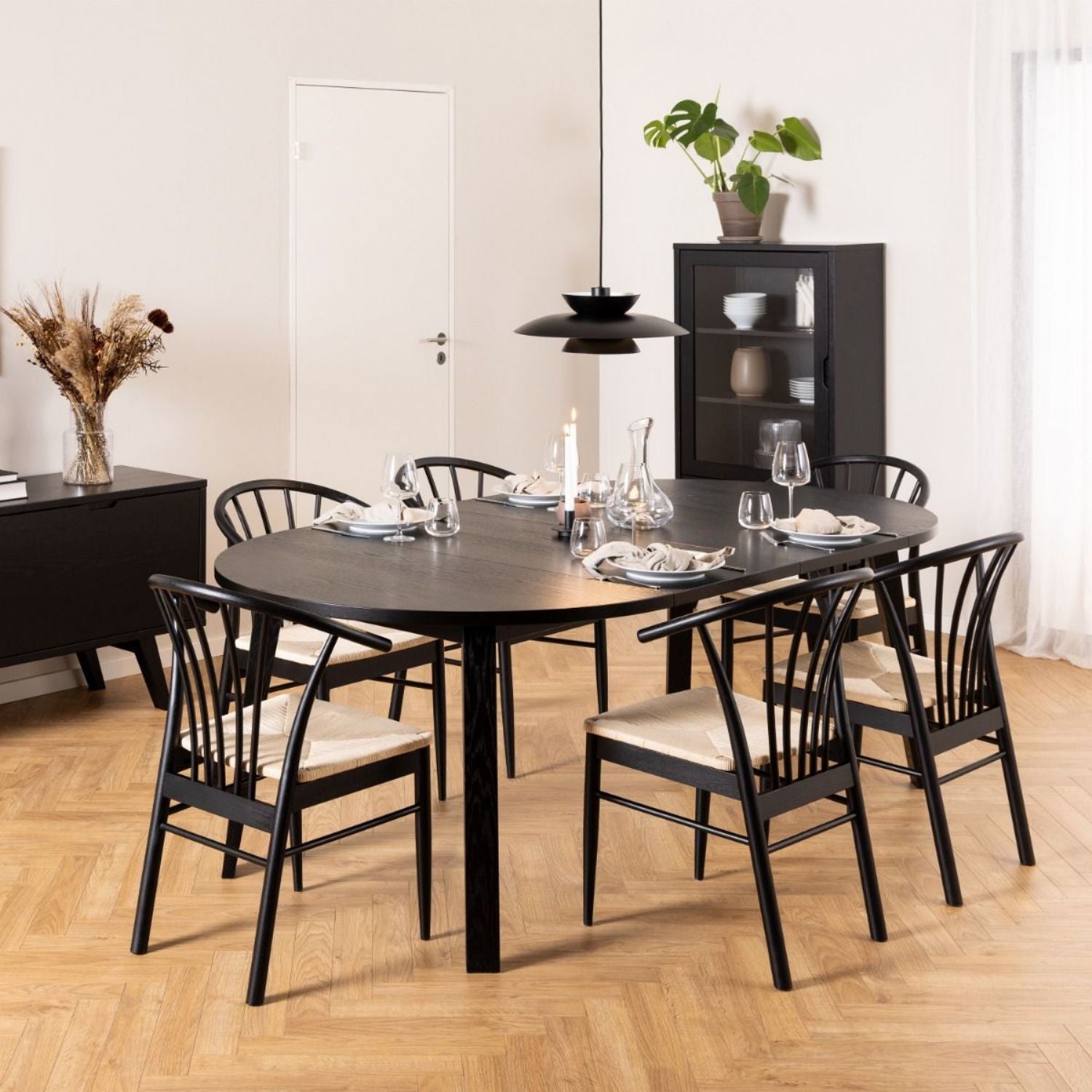 Montreux Round Extending Dining Table in Black 115154 cm includes 6 Cassandra Dining Chair includes Armrest in Black