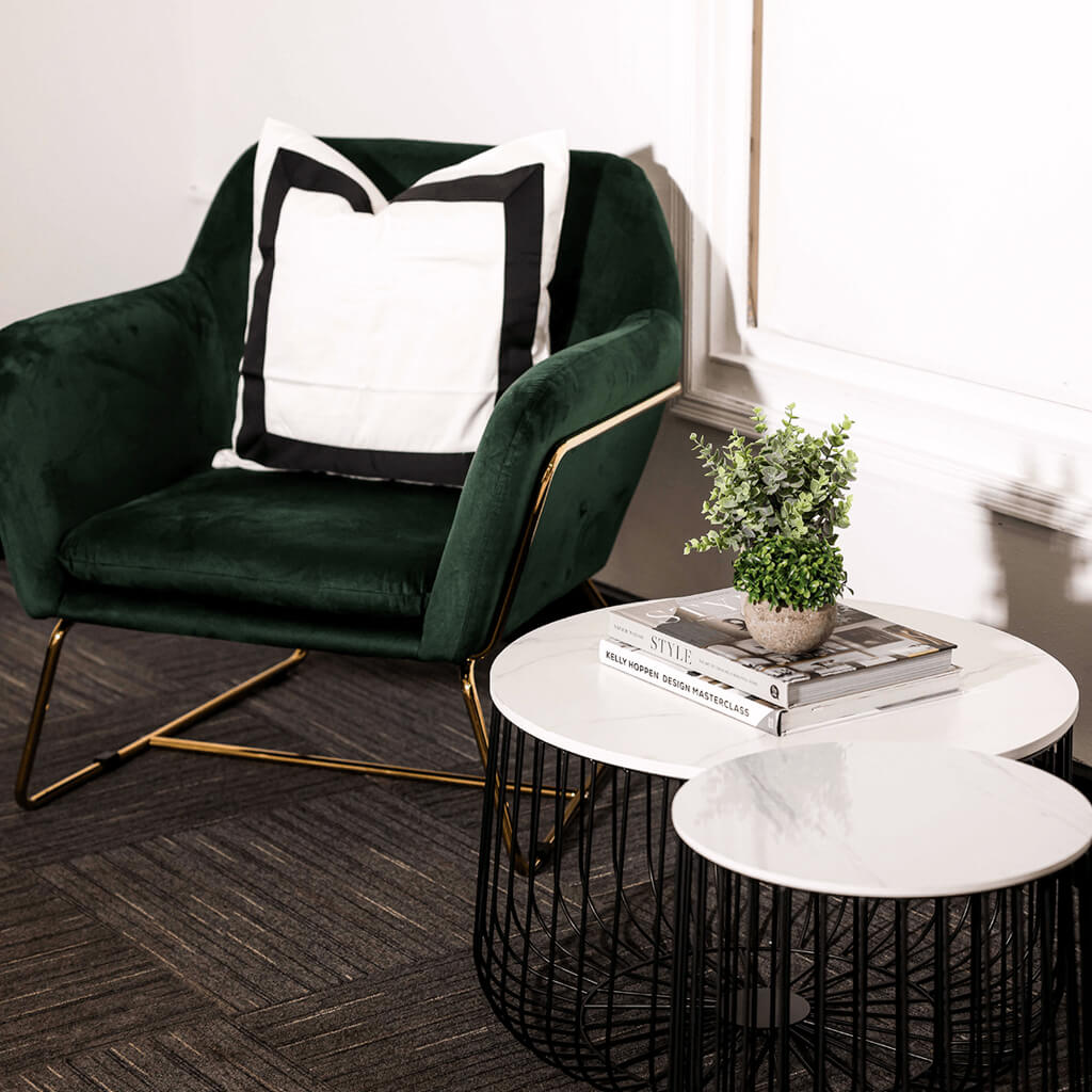 Green Velvet Upholstered Armchair with Gold Frame and Black Metal Legs